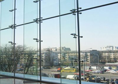 Structural spider glazing curtain wall installed on a commercial building